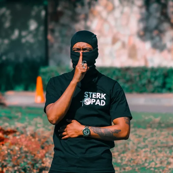 Eazy OGee in a balaclava and black SterkOpad tee