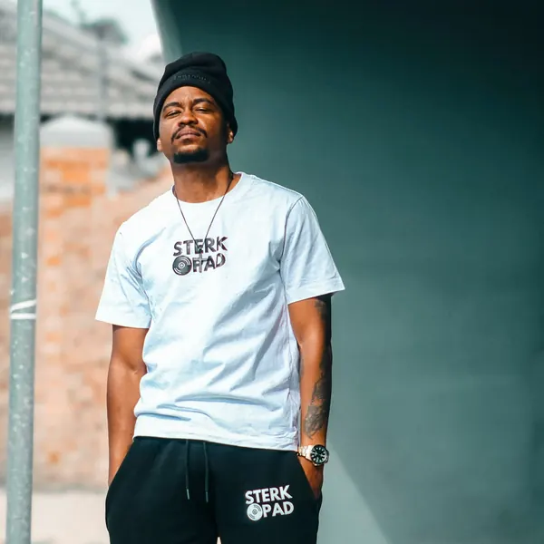 SterkOpad artist in a branded white tee