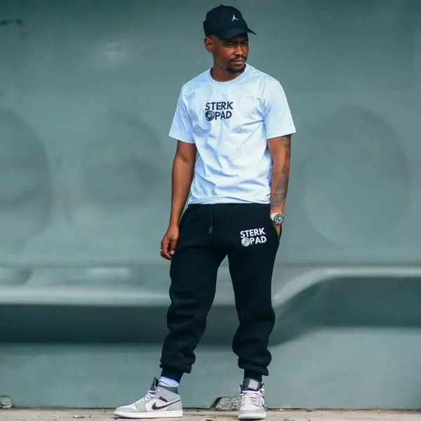 SterkOpad artist in branded white tee and joggers