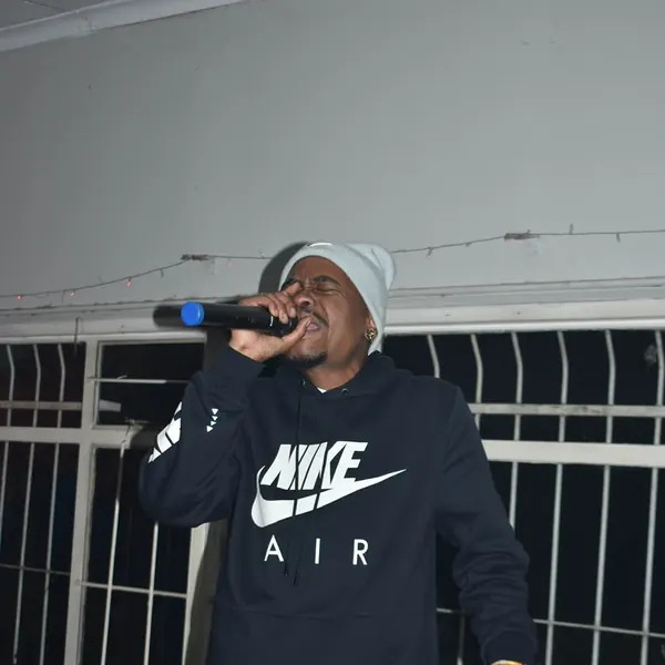 SterkOpad artist performing in a Nike hoodie