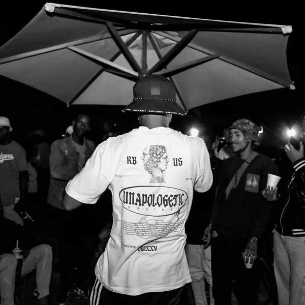 Black and white shot of a performer facing the crowd