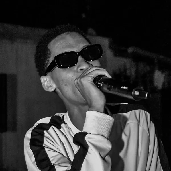 Larnie OGee on the mic at a live show