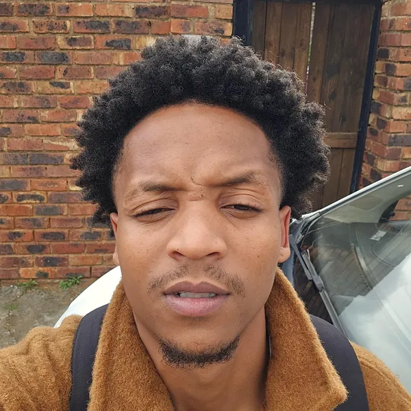 Xanny Pxxl in a tan fleece jacket
